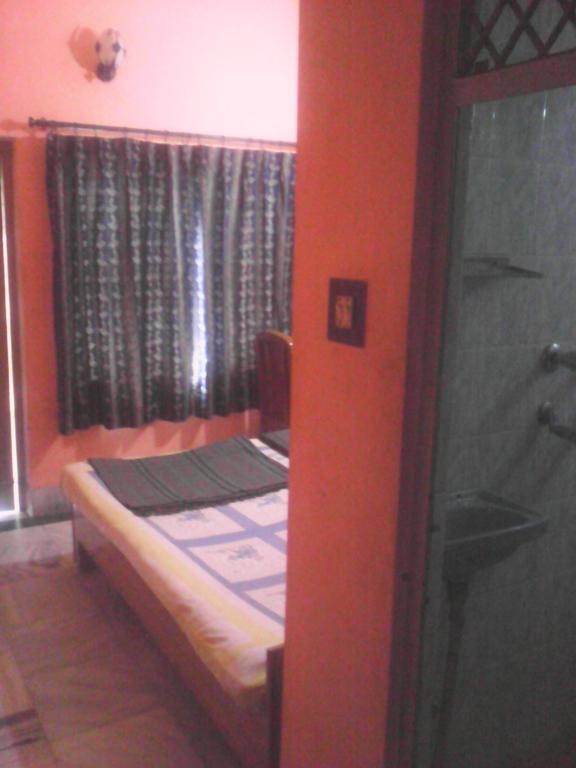 Leela Pensión Varanasi Habitación foto